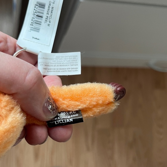 Kipling Vibrant Orange Plush Keychain - Picture 8 of 9